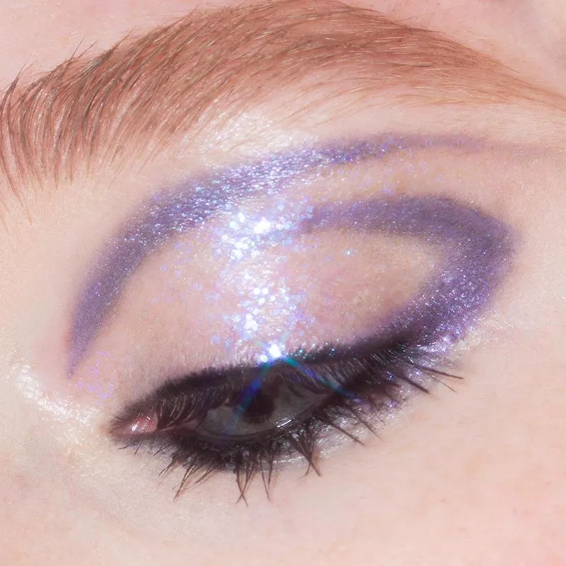 Abstract purple glitter cut crease eyeliner look