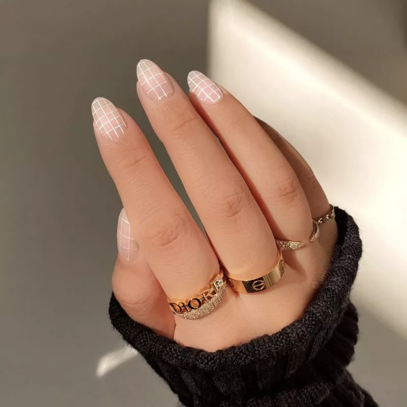 Natural nails with white grid design