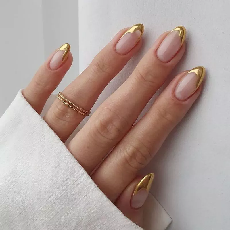 French manicure with gold tips