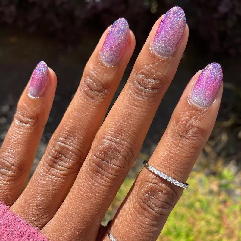 Purple, pink, and silver glitter ombre nails