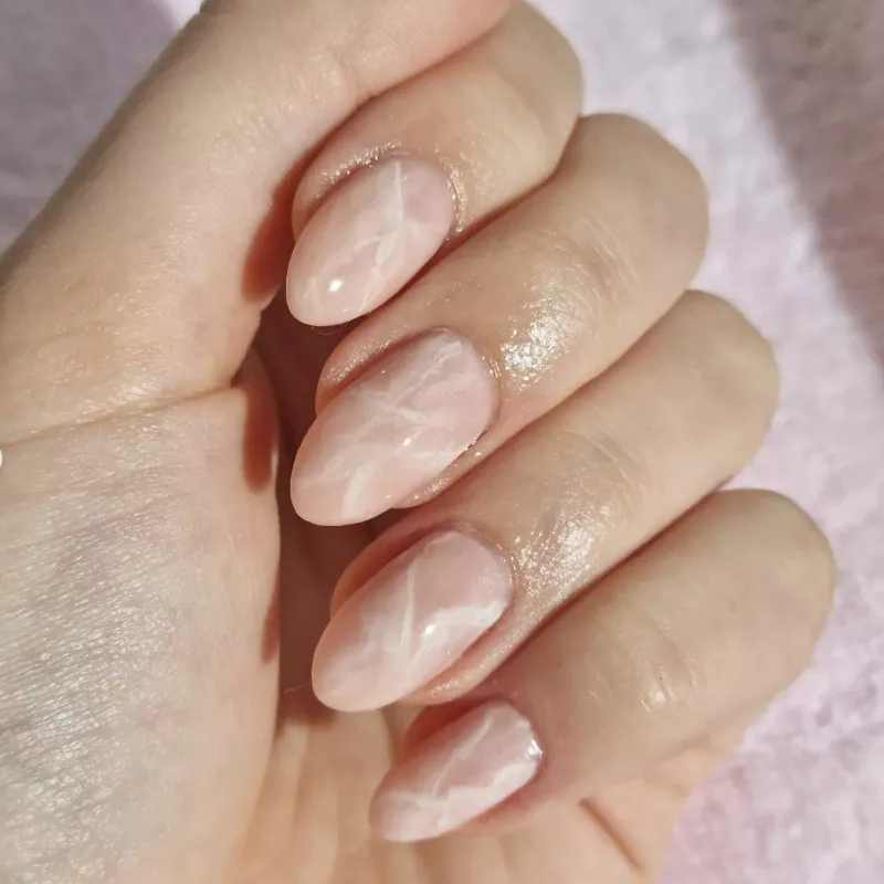 Pinkish-nude marble nail design