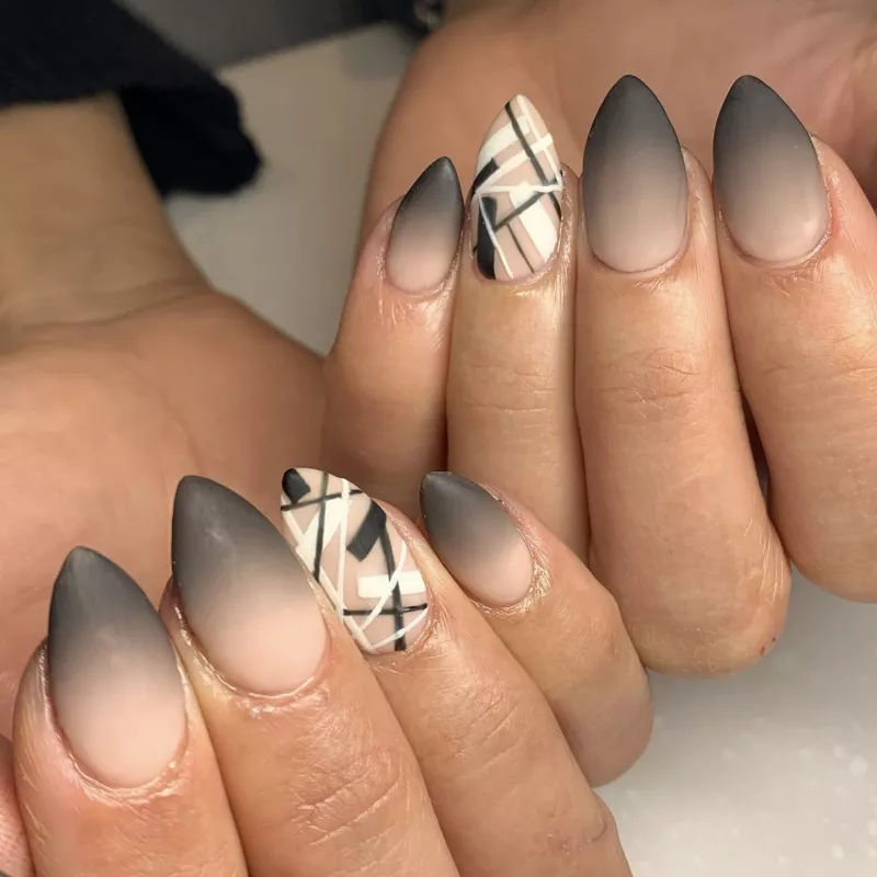 black ombre nails with abstract line design