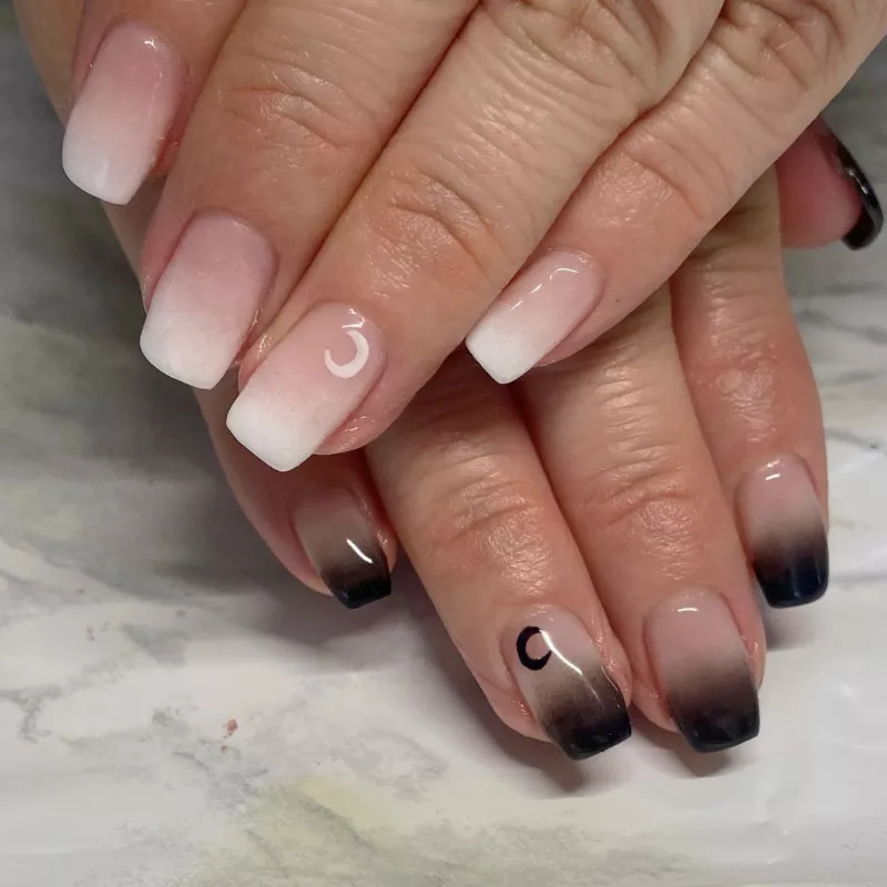 black and white ombre nails with moon details