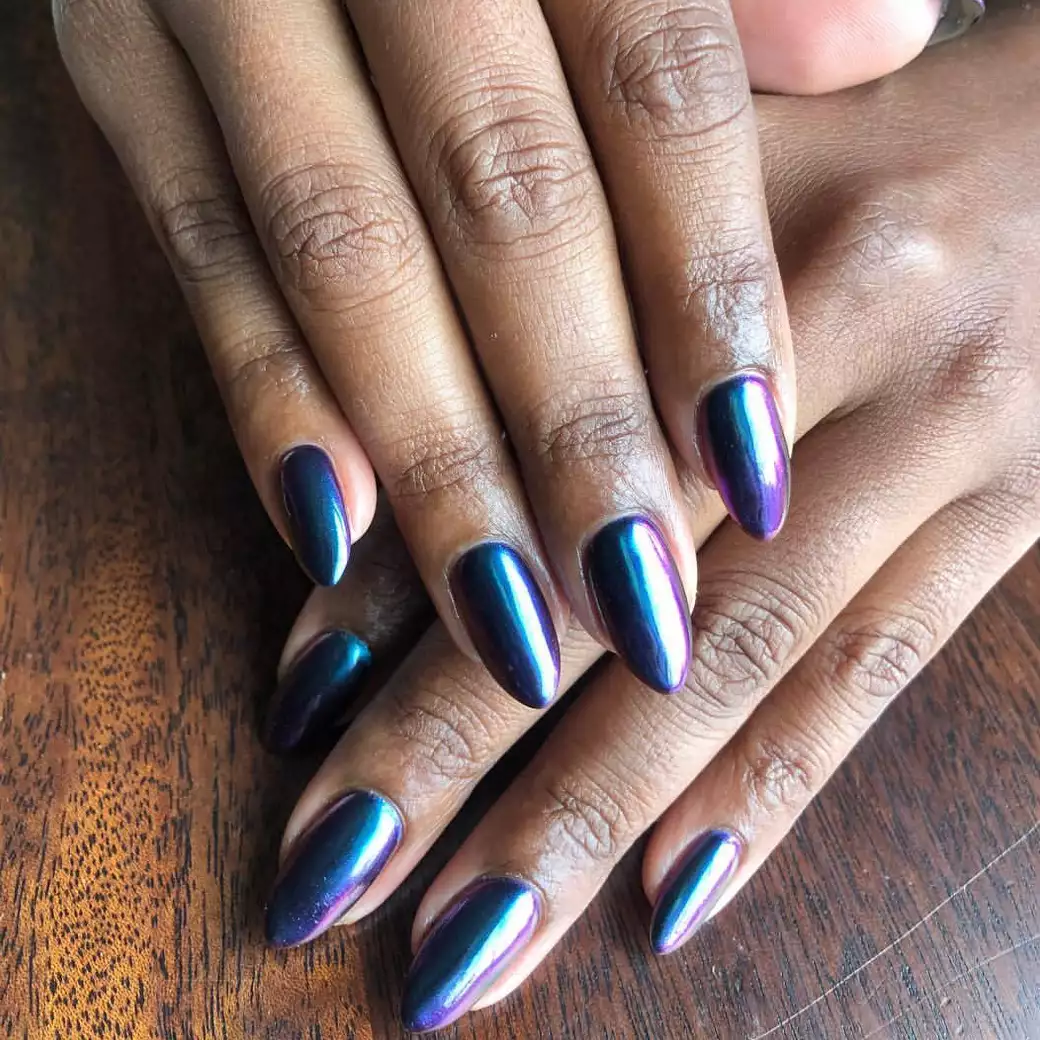 Purple holographic almond shaped nails