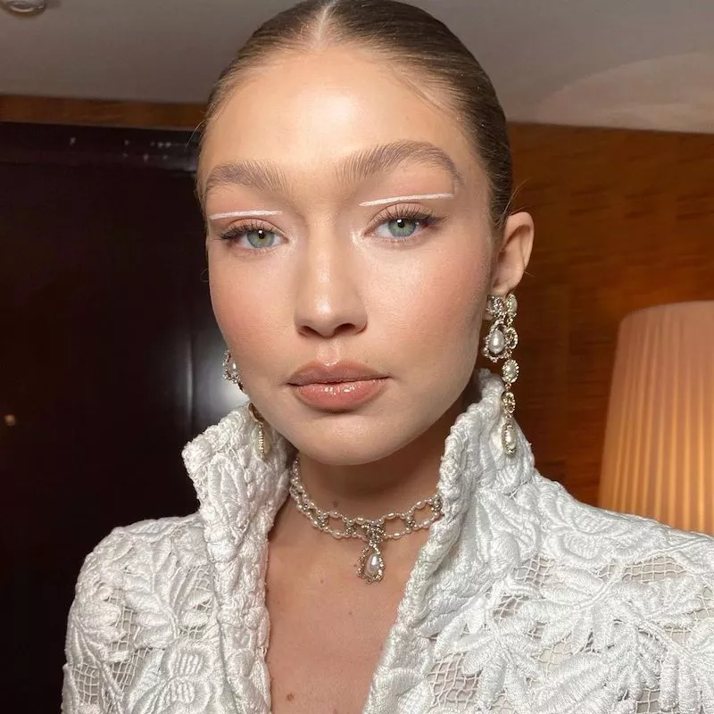 Gigi Hadid wears an abstract straight white floating eyeliner look