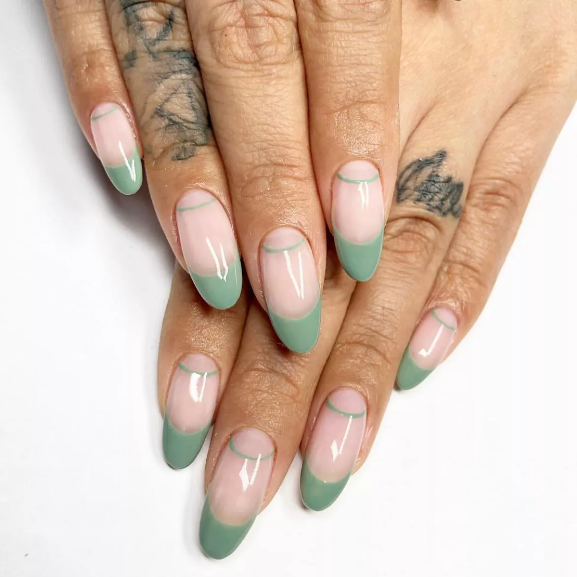 Almond shaped sage green tips nails