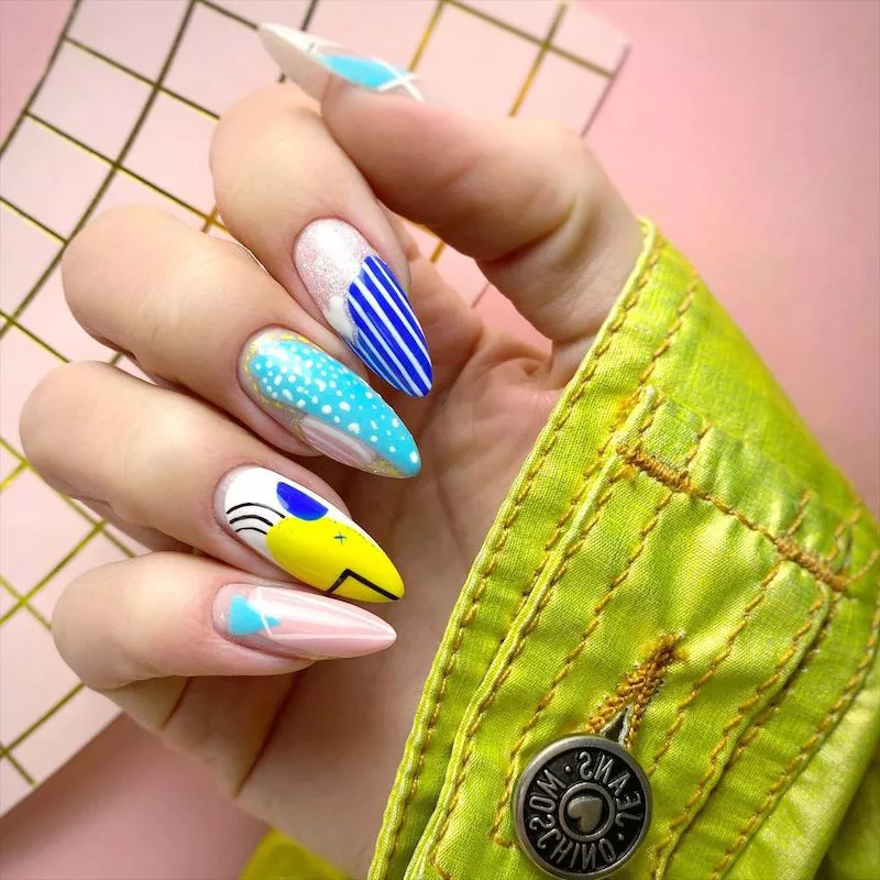 Almond-shaped nails with various abstract designs