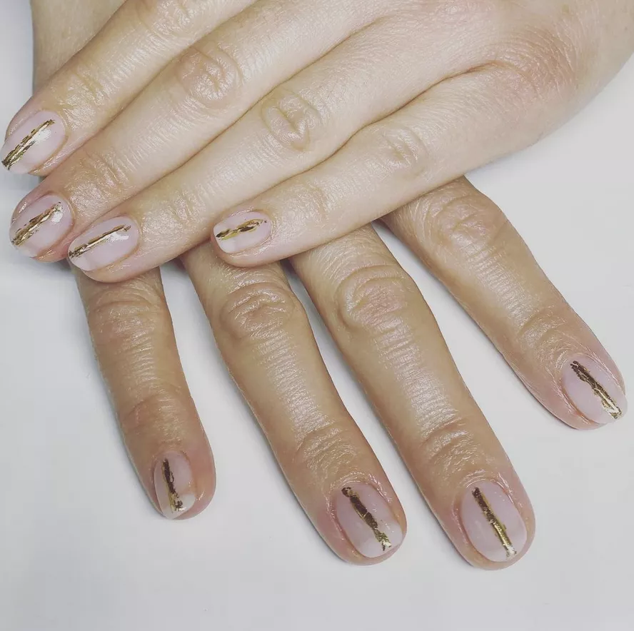 sweep of gold clear nail design