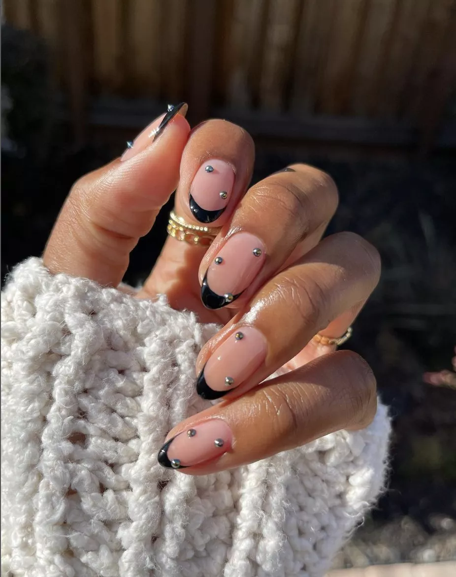 black tips on clear nails with jewels