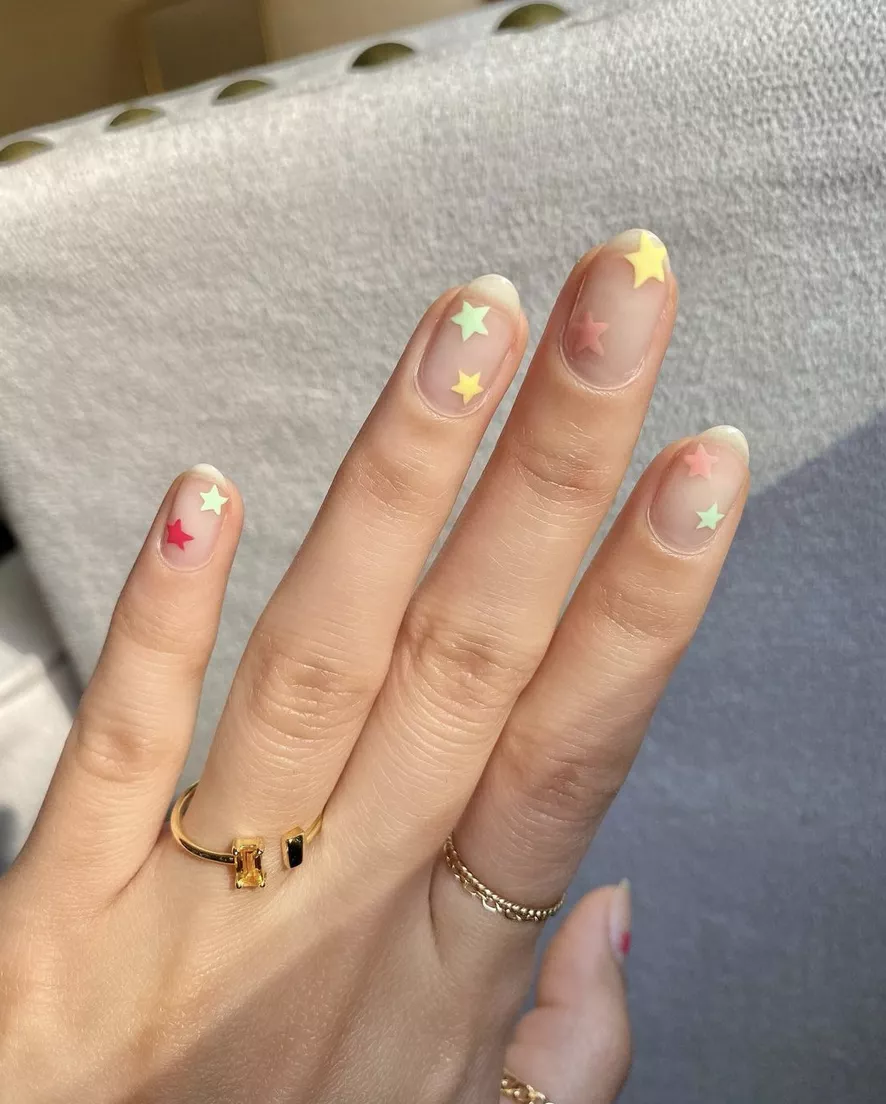 clear nail design with stars
