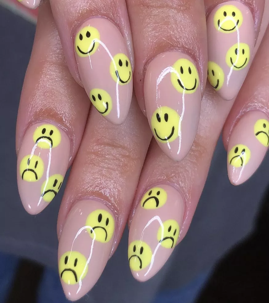 classic yellow smiley face nail manicure