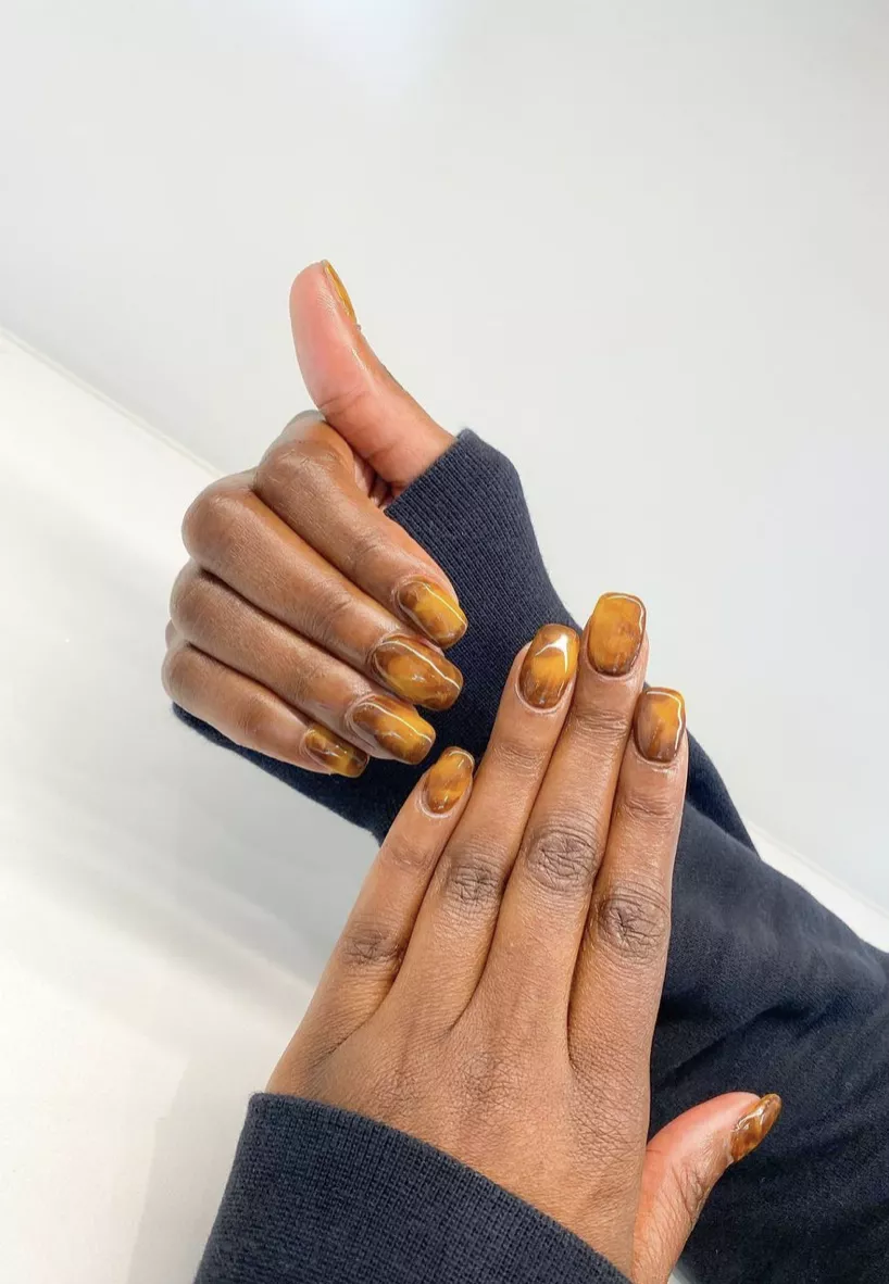 caramel-colored dip powder nail manicure 