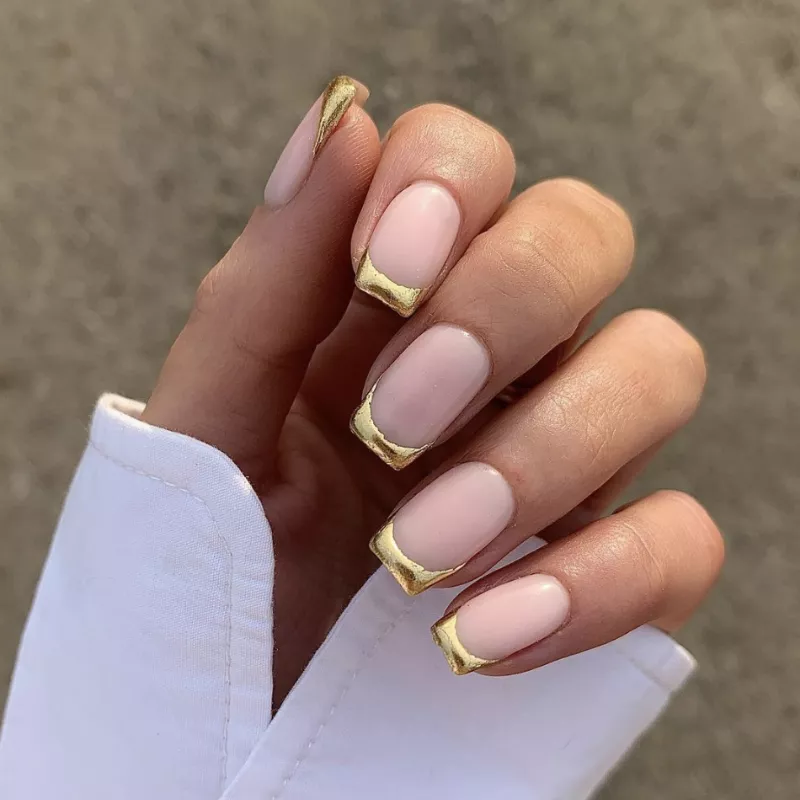 french manicured nails with gold chrome tips