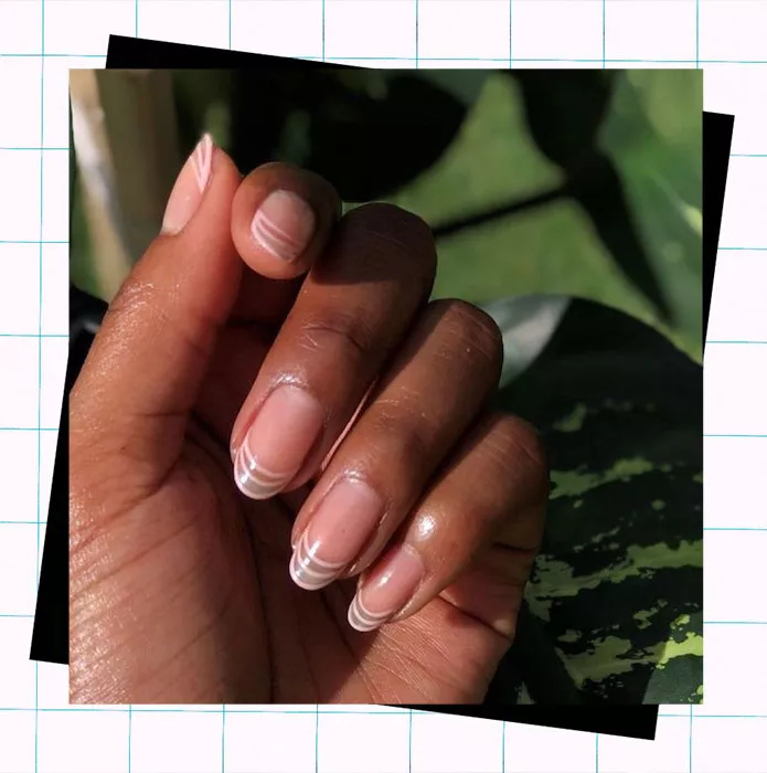 woman with clear nail design