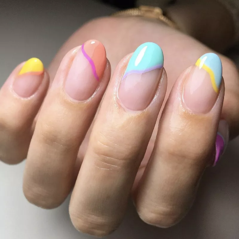 Two-toned pastel diagonal tip nail art