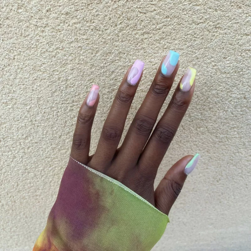 Negative space multicolor abstract pastel nail art