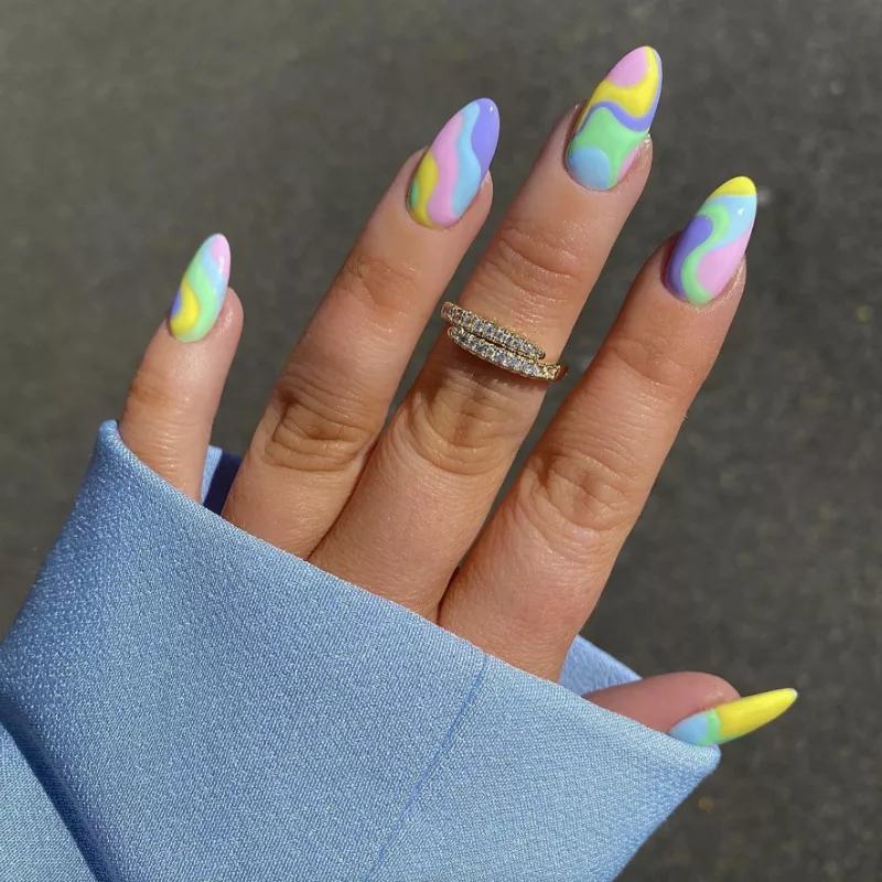 Pastel neon rainbow swirl nail design