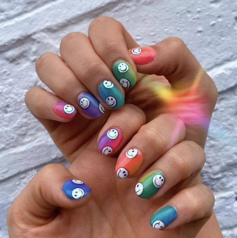 rainbow nails with smiley faces