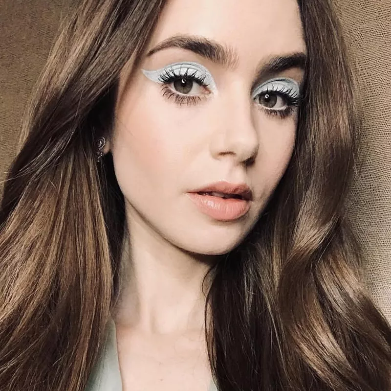 Lily Collins in icy blue eyeliner