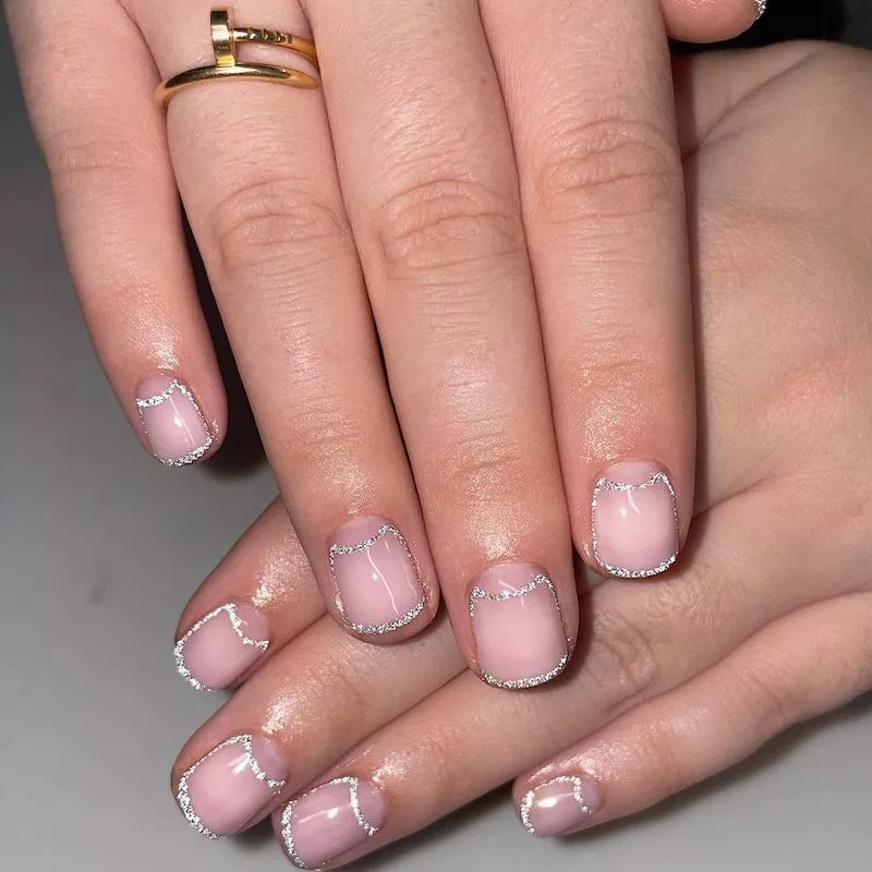 Silver glitter subtle half-moon nails with French tips