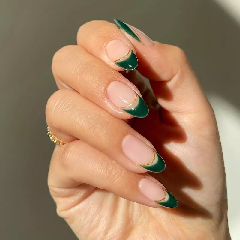 Double French manicure with thick emerald green tip and thin gold arc