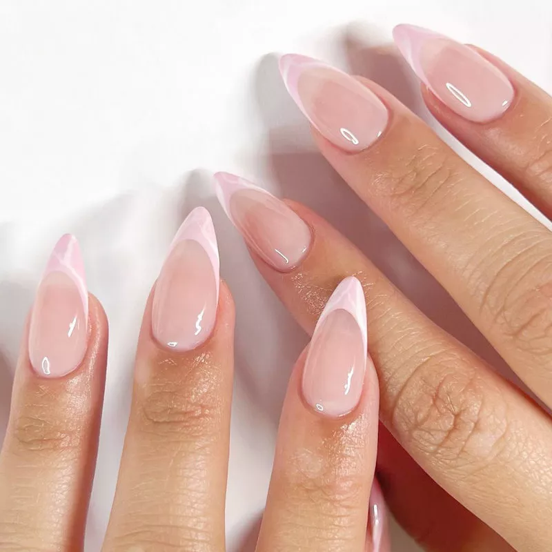 Two-tone pink French manicure with sculpted gel stiletto tip