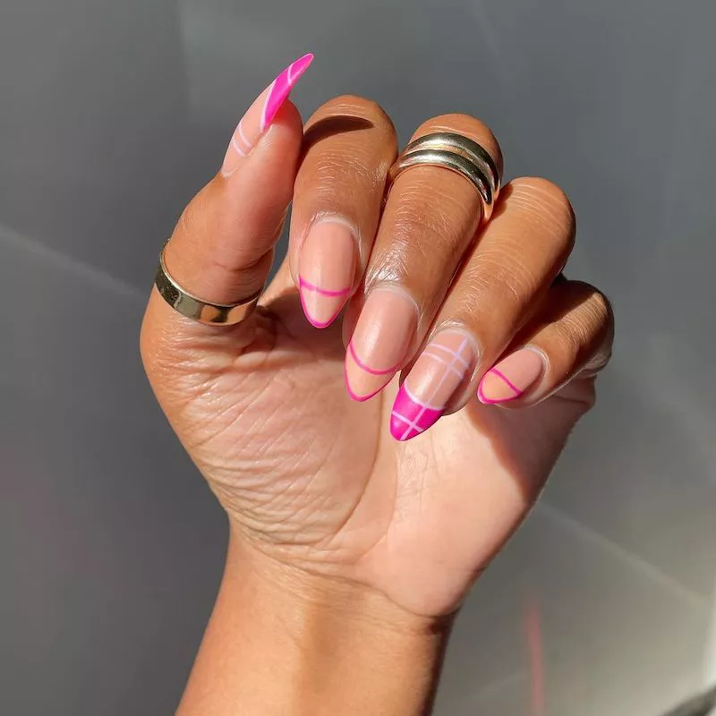 Double French manicure with pink geometric tips and accent plaid