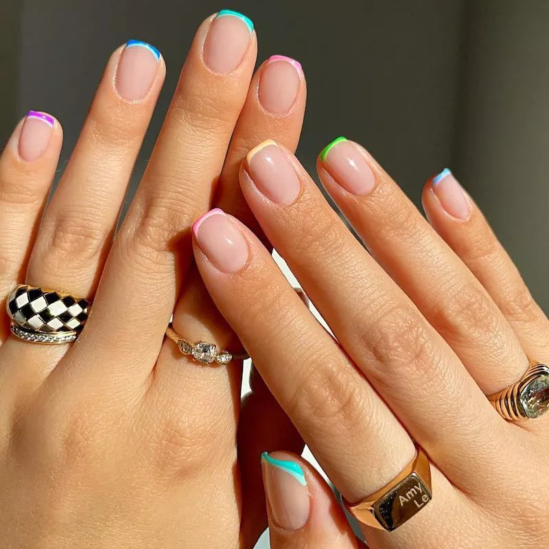 Double French manicure with thin multicolor tips