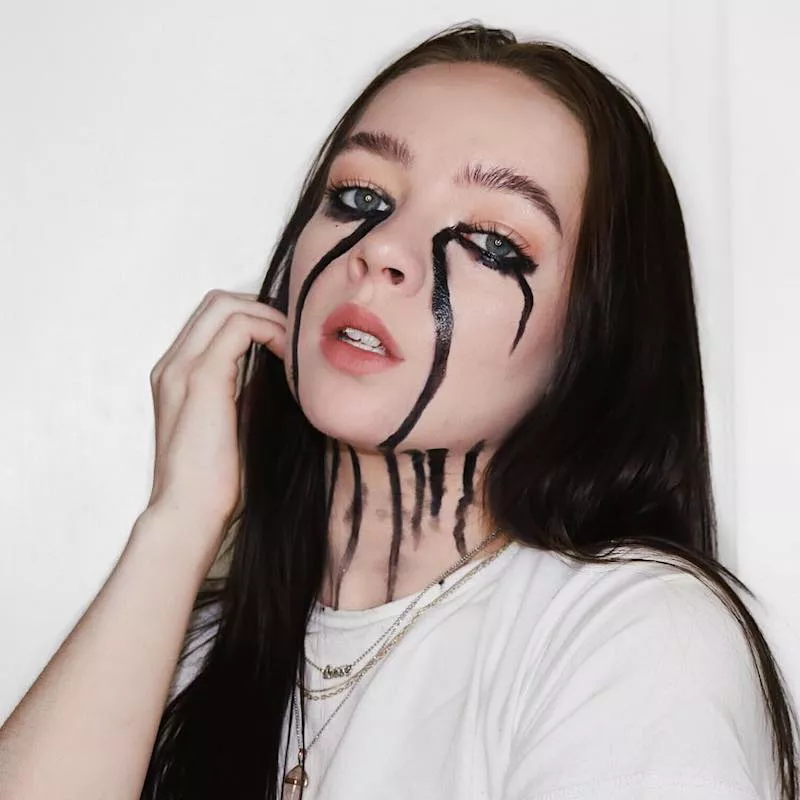Makeup artist wears Billie Eilish-inspired black tears makeup look
