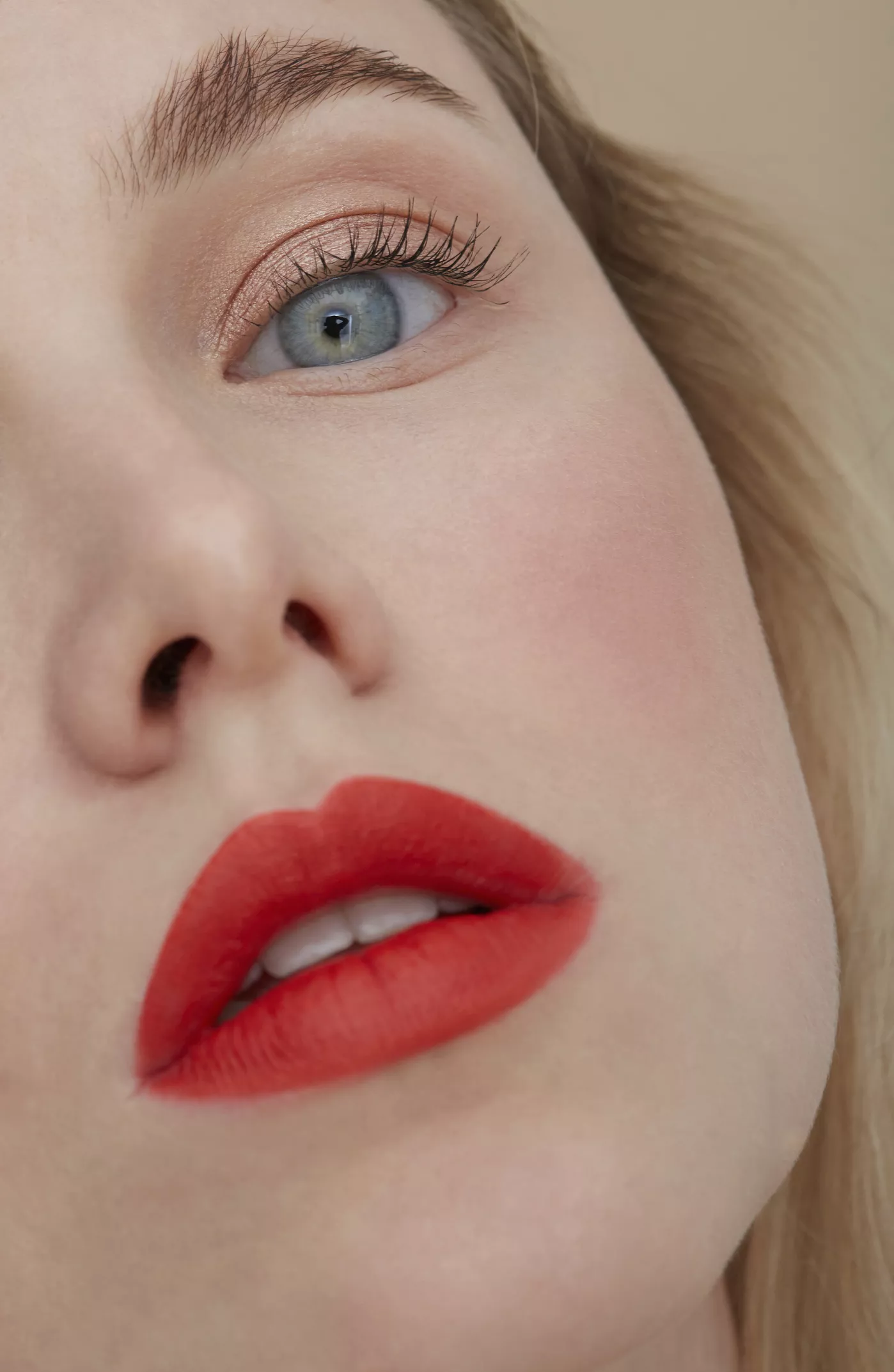 closeup portrait of woman with red lip and intense blush