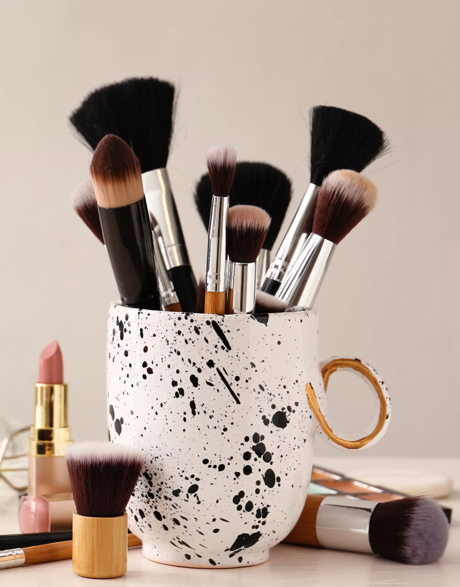 Makeup brushes in coffee cup