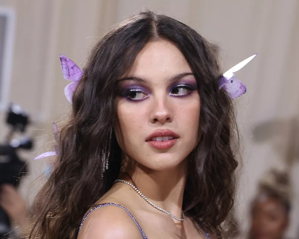 Olivia Rodrigo wears purple butterfly-inspired makeup to the 2022 Met Gala