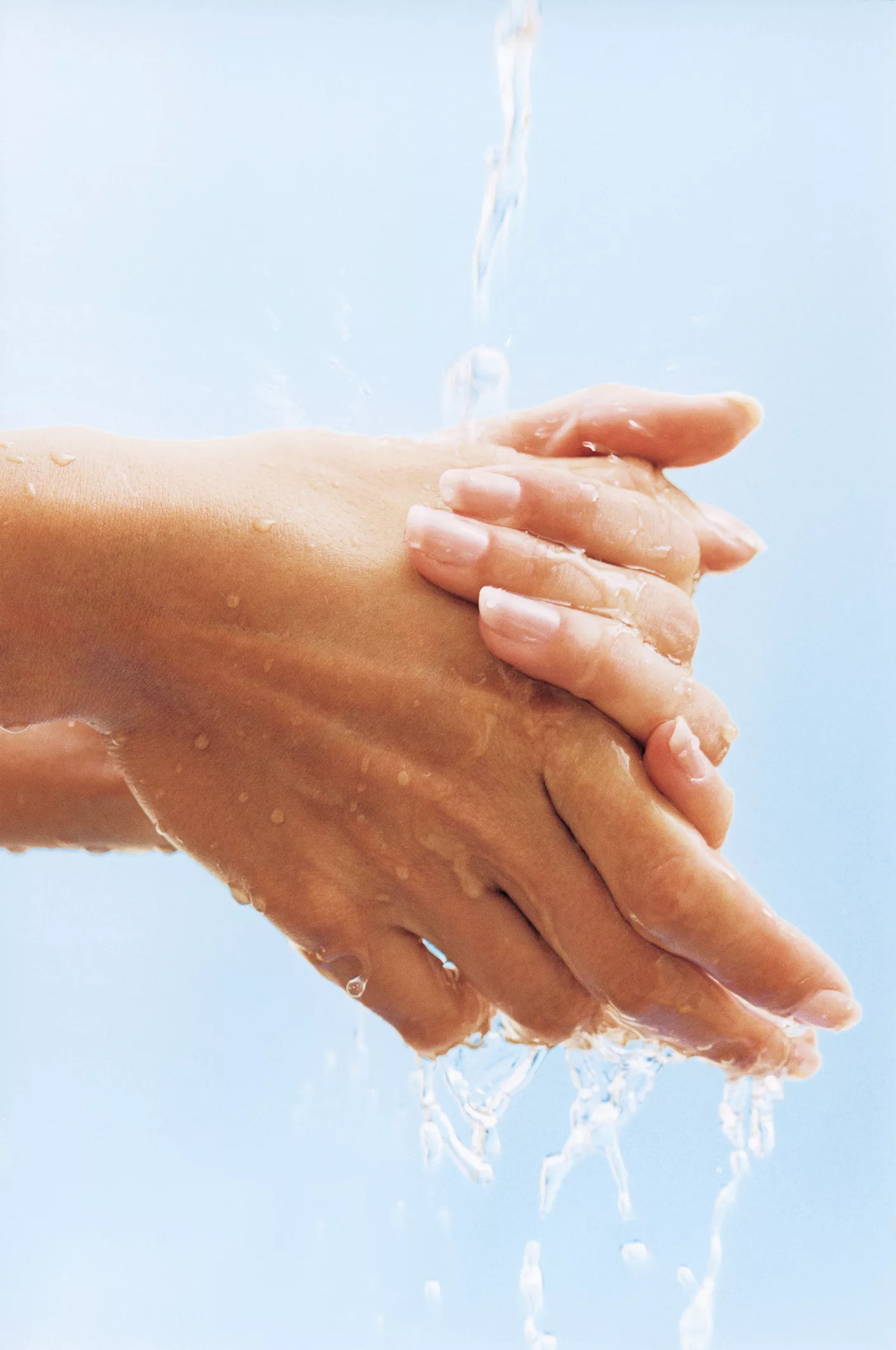 Close-up of woman washing hands