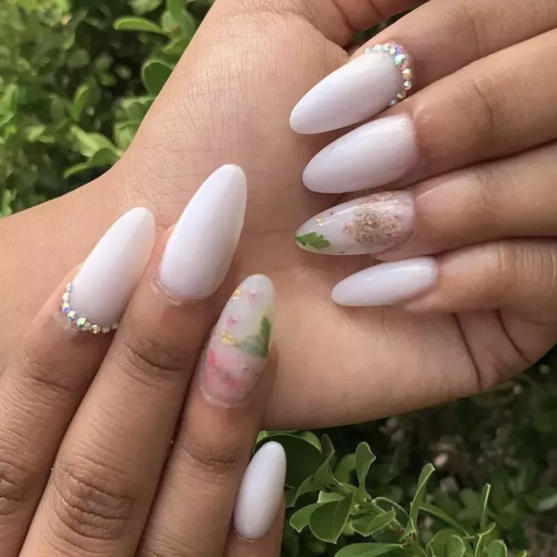 White manicure with pink and gold milk bath accent nails