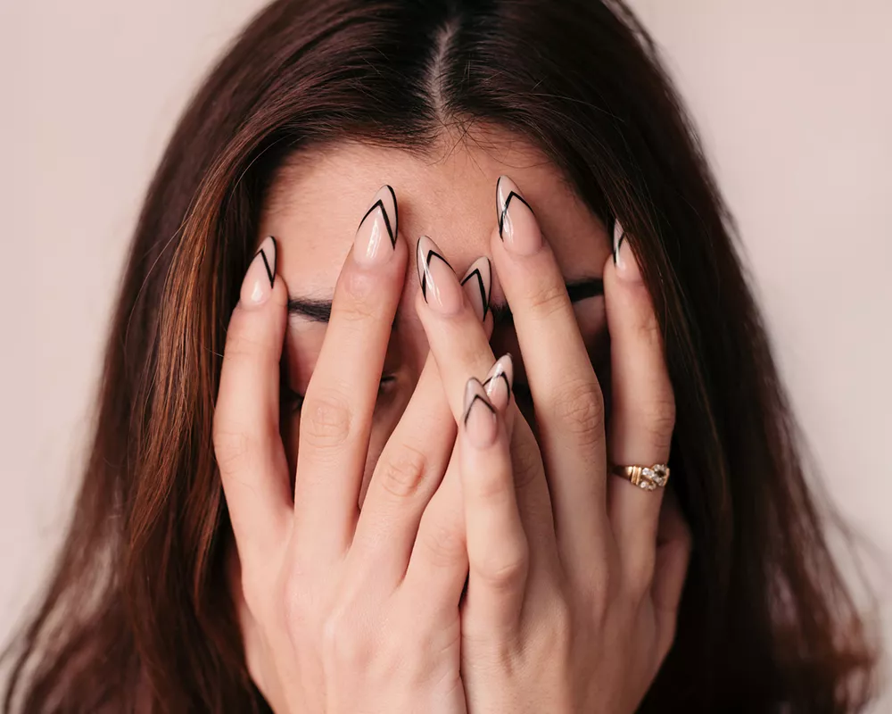 woman with long manicure