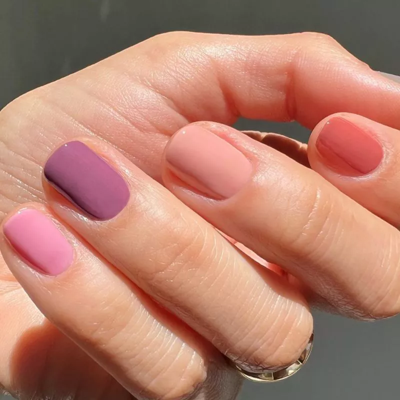 Ombre pink nails painted using the Italian manicure technique.