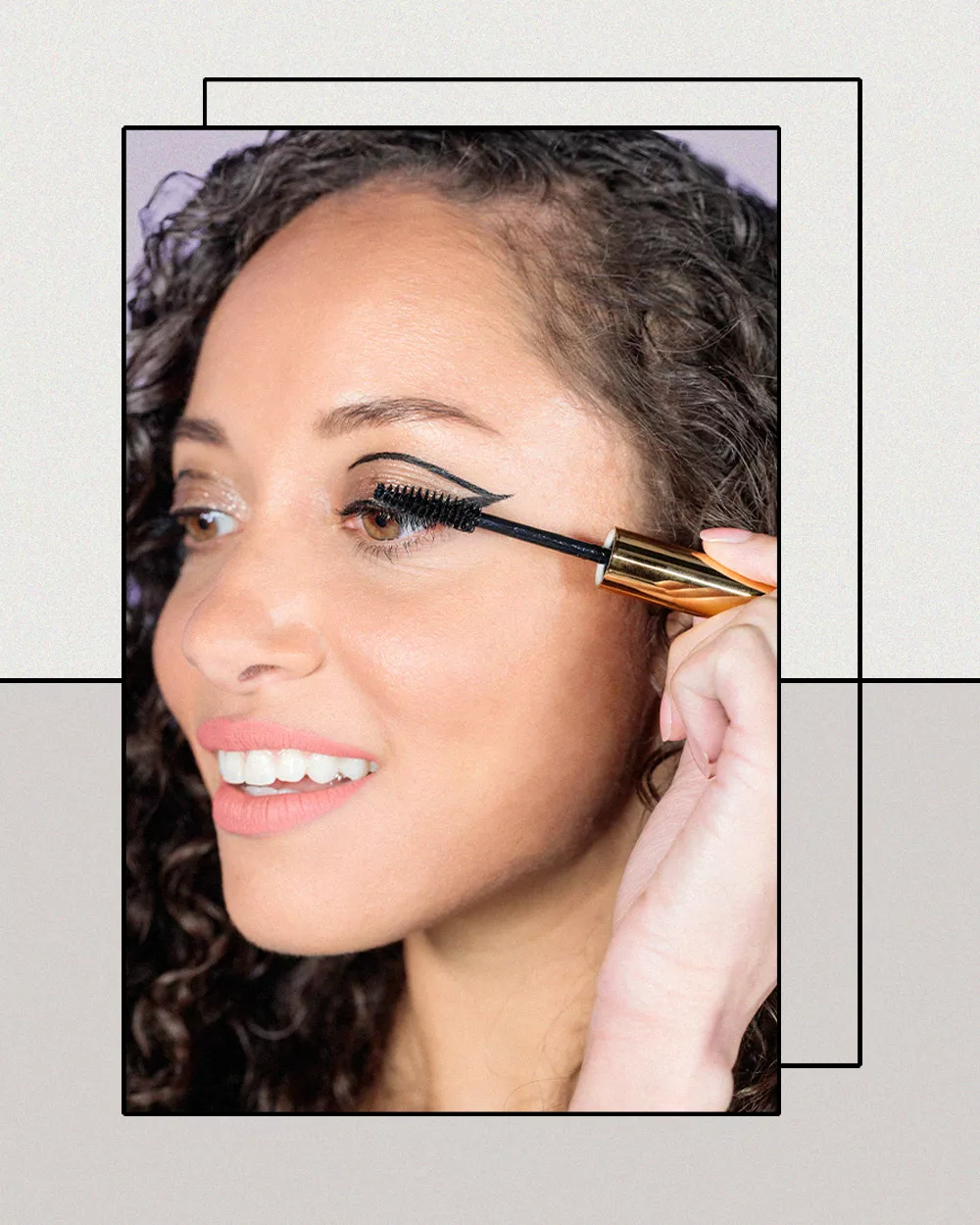 BIPOC Woman Applying Mascara in Addition to her Beige Sparkly Eyeshadow and Graphic Eyeliner
