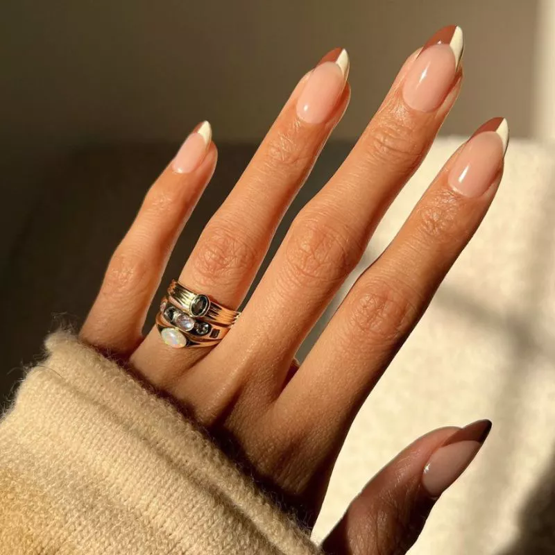 Manicure with white and brown French tips half-and-half