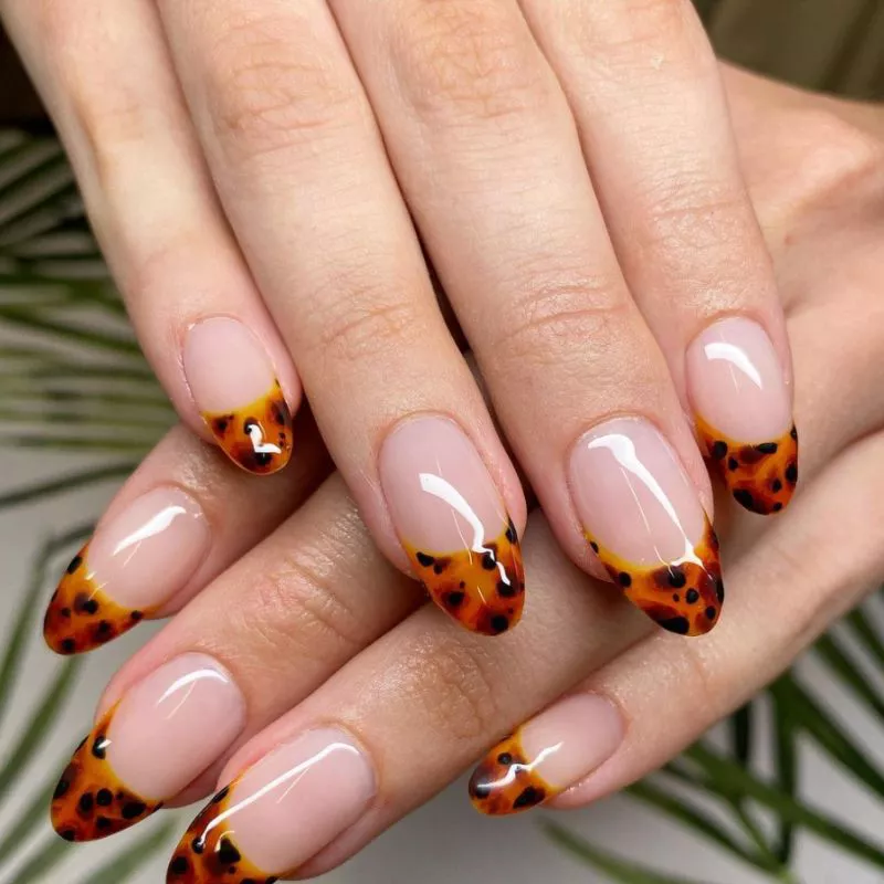 French manicure nails with brown leopard print tips