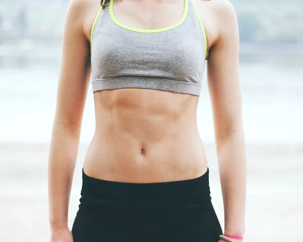 woman showing abs