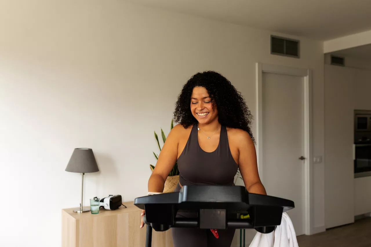 Woman on a treadmill in her home