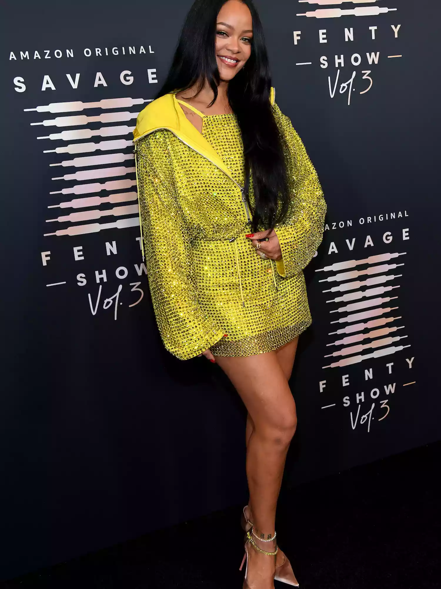 Rihanna wears a yellow sequined look and pointed-toe heels to the Savage x Fenty Show Vol. 3
