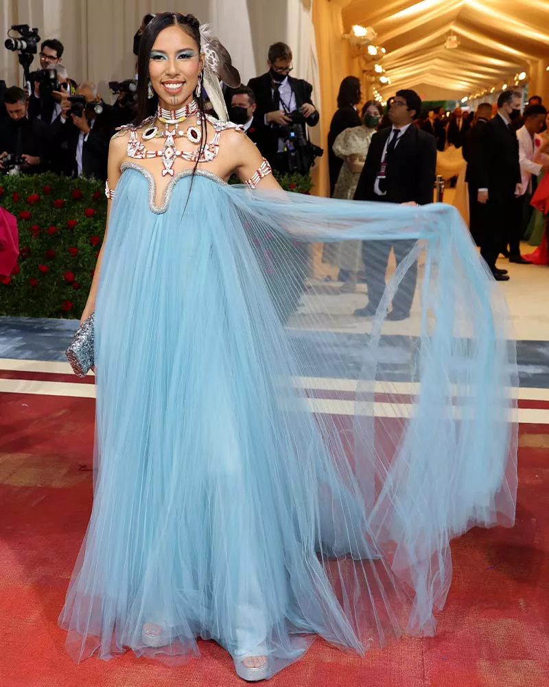 Quannah Chasinghorse wearing a teal tulle gown at the 2022 Met Gala.