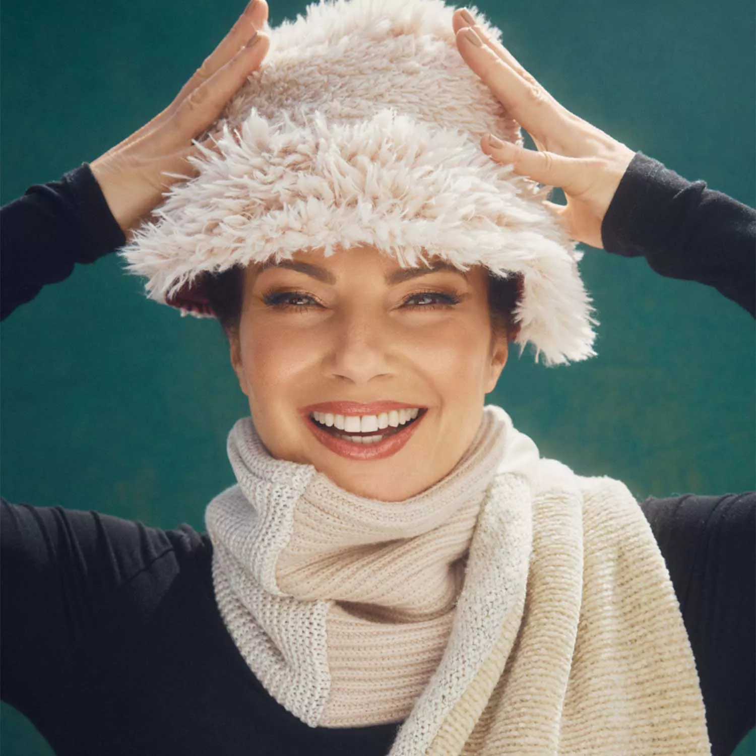 Fran Drescher wearing an upcycled hat and scarf for thredUP