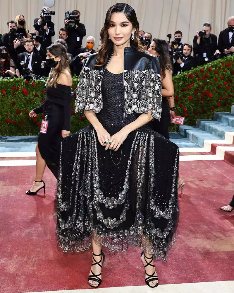 Gemma Chan wearing a sparkling black Louis Vuitton dress at the 2022 Met Gala.