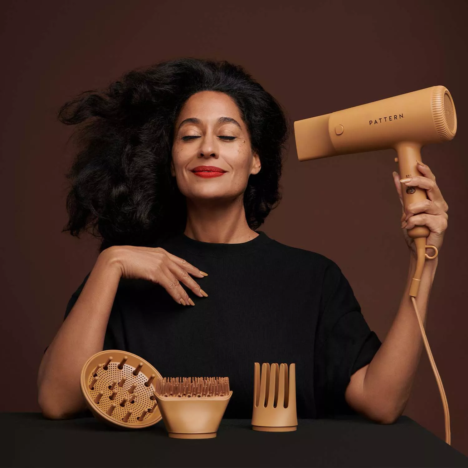 Tracee Ellis Ross with Pattern hair dryer 