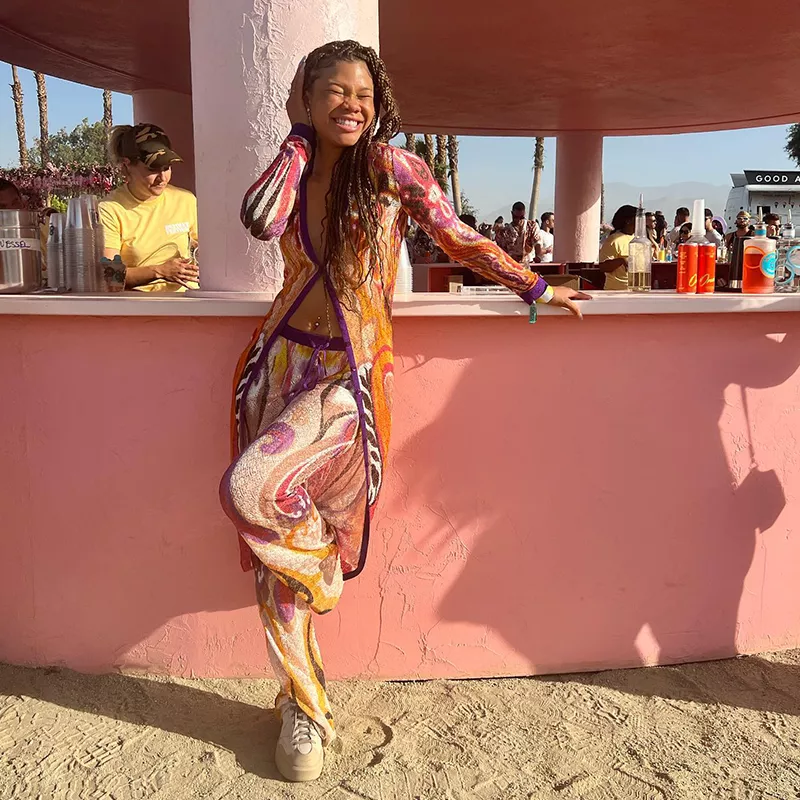 Storm Reid wearing a Pucci-inspired retro print set at Coachella