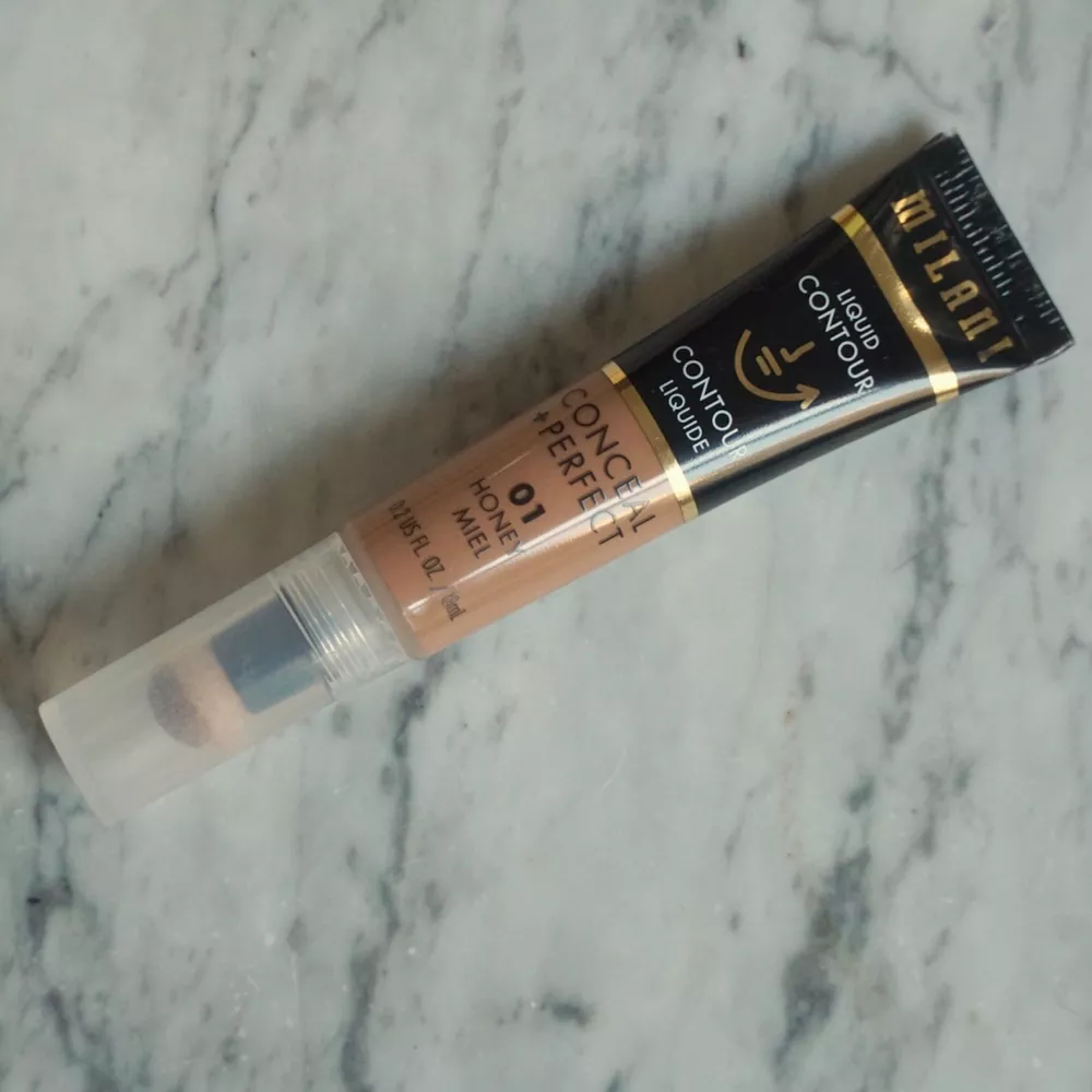 Milani Conceal + Perfect Liquid Contour on marble background