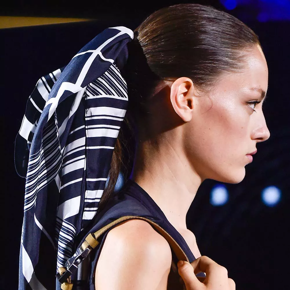Model wearing a scarf on her ponytail at Rag & Bone wunway show