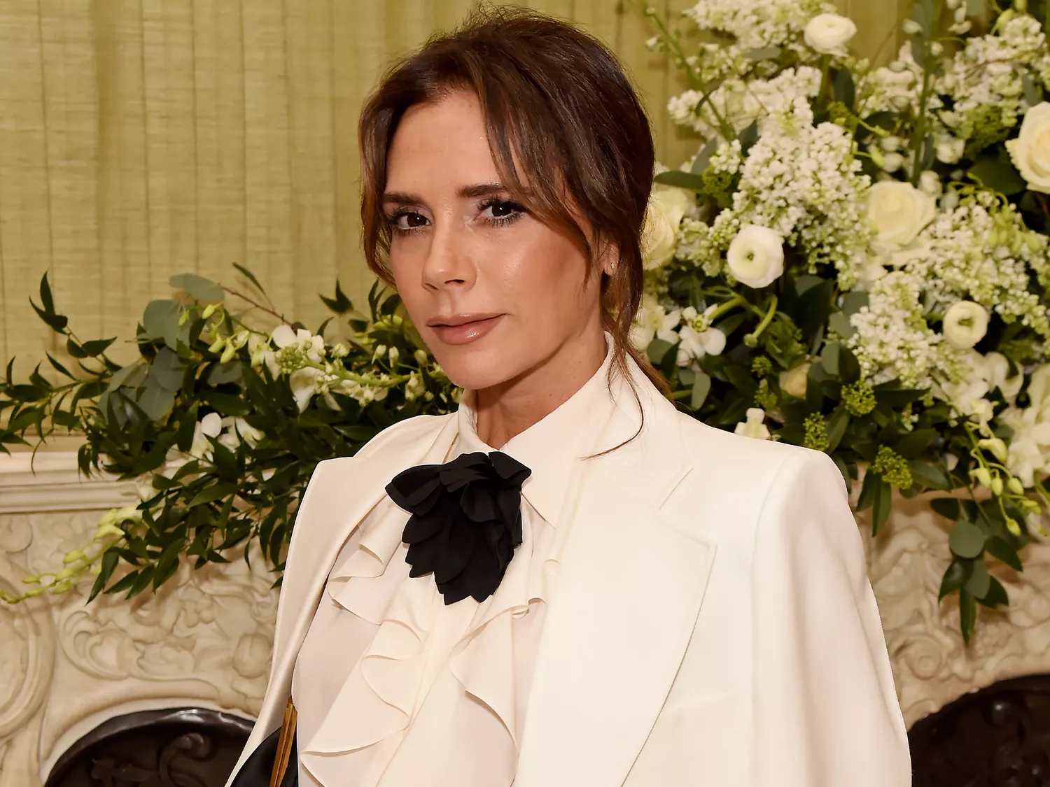 Victoria Beckham in a white suit